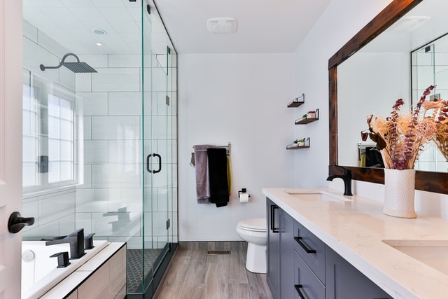 Bathroom with large mirror